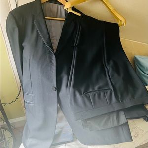 Black Gucci tux. Bought in Rome. Good condition with original hanger.